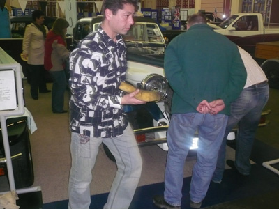 Julien &  Amanda Chen sponge at the ready getting the car cleaned up after the long journey to Alley Pally 