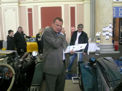 New member Steve Moore negotiating a purchase of a car. 